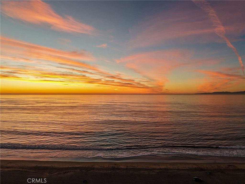 Living room with floor-to-ceiling ocean view